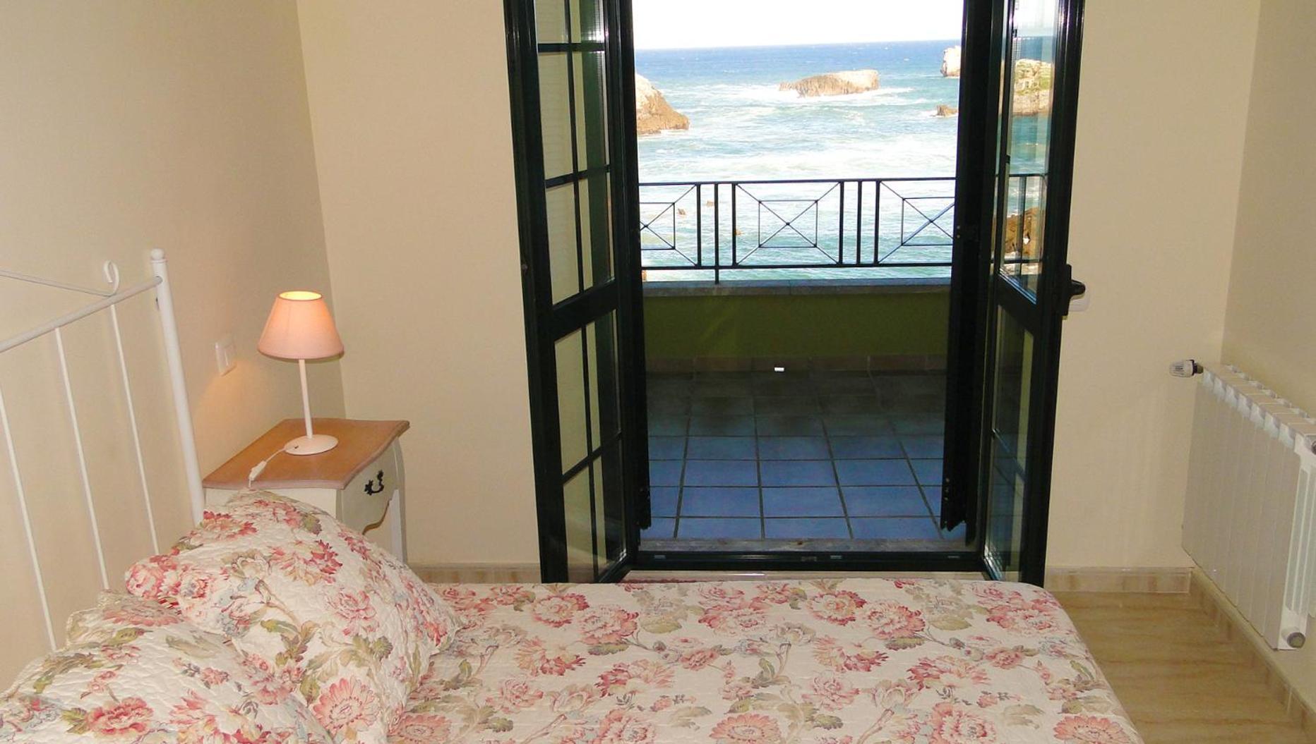 Apartamentos El Pinedo Noja Pokoj fotografie