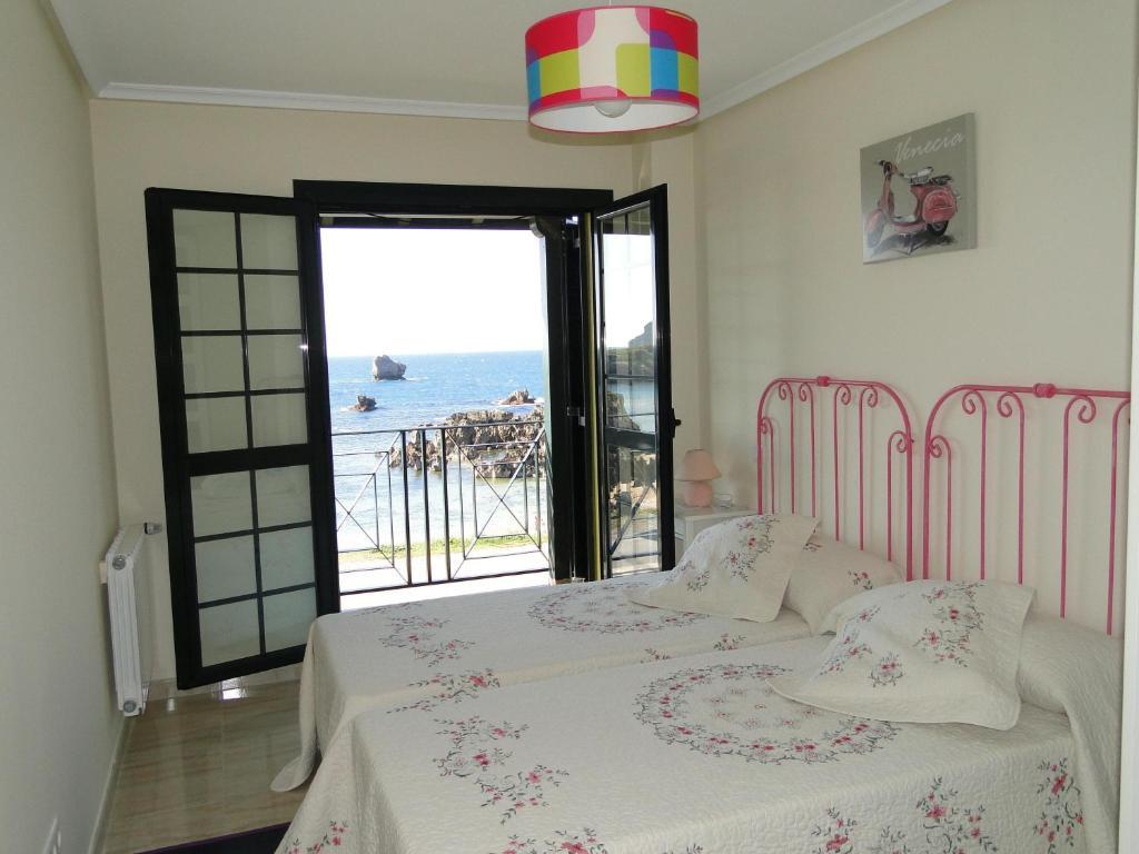 Apartamentos El Pinedo Noja Pokoj fotografie